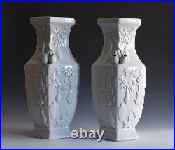 A Pair Of Large Chinese Dehua Glazed Molded Vases