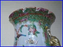 A large 19th. Century Chinese Canton Vase, in a repaired condition, 45cms high