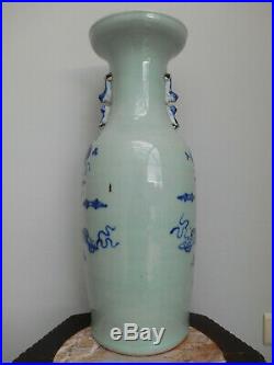 A large 19th century celadon ground vase with a blue decoration of antiquiteis