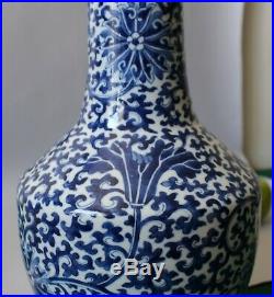 A large Chinese blue & white scrolling lotus bottle vase Kangxi mark 19thc Qing