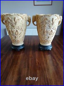 A pair of Vintage Carved Resin/Soapstone Oriental Vases Elephant Head Handles