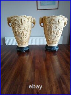 A pair of Vintage Carved Resin/Soapstone Oriental Vases Elephant Head Handles