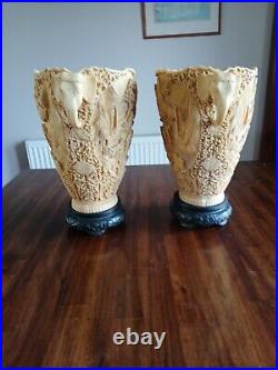 A pair of Vintage Carved Resin/Soapstone Oriental Vases Elephant Head Handles