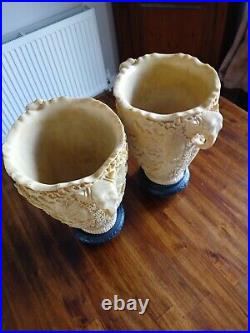 A pair of Vintage Carved Resin/Soapstone Oriental Vases Elephant Head Handles