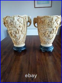 A pair of Vintage Carved Resin/Soapstone Oriental Vases Elephant Head Handles