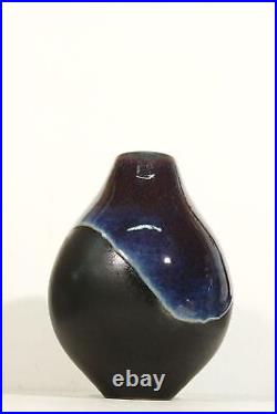 André Pelt Large ovoid vase in turned stoneware black enamel blue red glaze