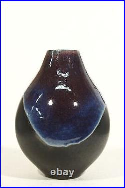 André Pelt Large ovoid vase in turned stoneware black enamel blue red glaze