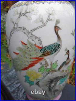 Large Chinese famille rose hand painted vase with writing to side