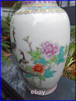 Large Chinese famille rose hand painted vase with writing to side