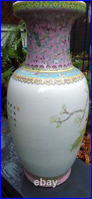 Large Chinese famille rose hand painted vase with writing to side