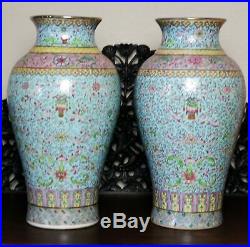 Pair of Large Hand Painted Chinese Turquoise Ground Famille Rose Porcelain Vases