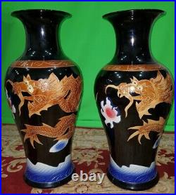 Pair of large oriental vases dragon painted