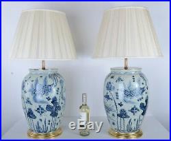 Unusual pair of large ceramic Chinese vase lamps with gild bases